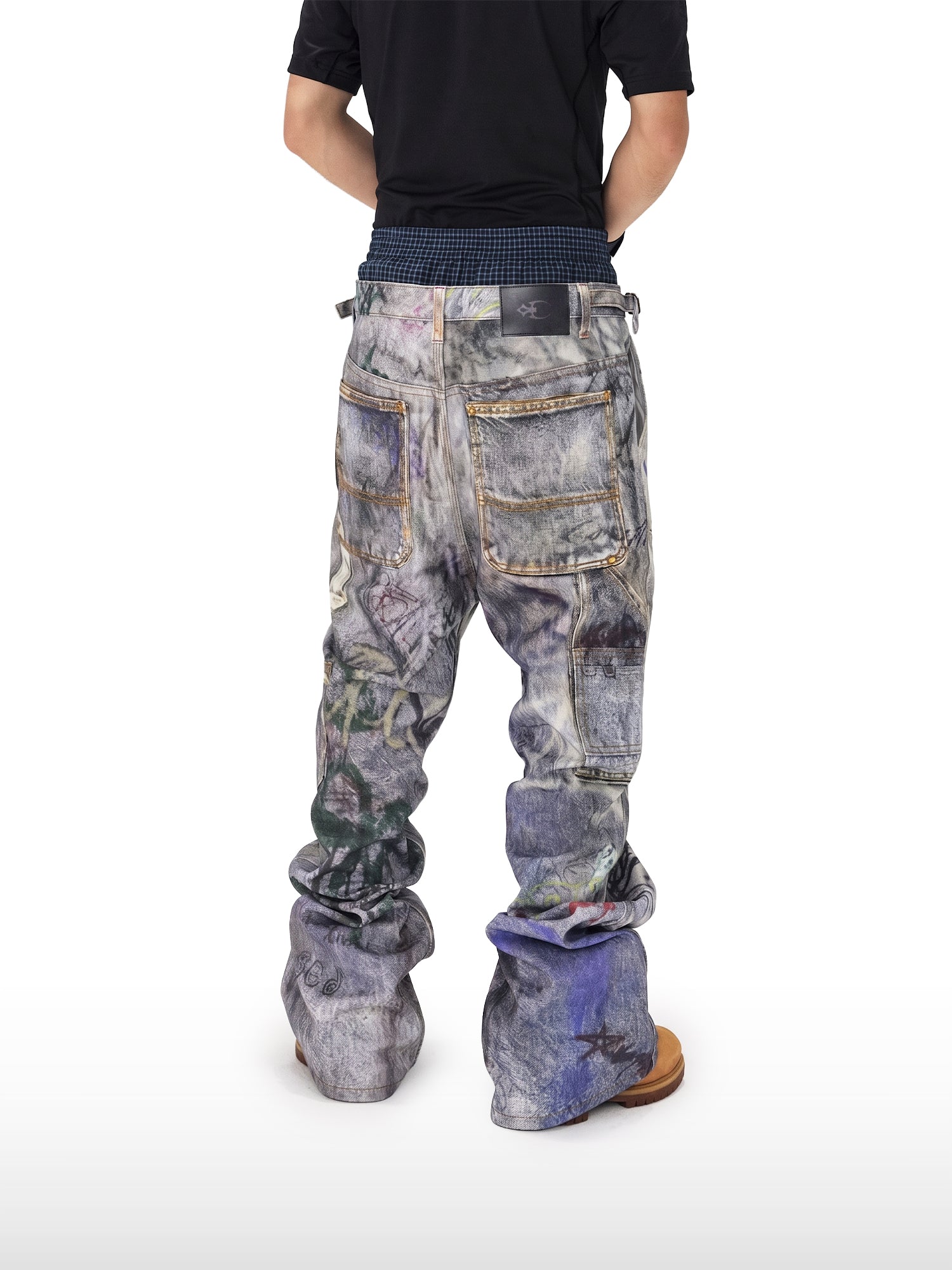 Graffiti-jeans met gelaagde tailleband