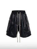 Beschichtete Shorts mit Reißverschluss