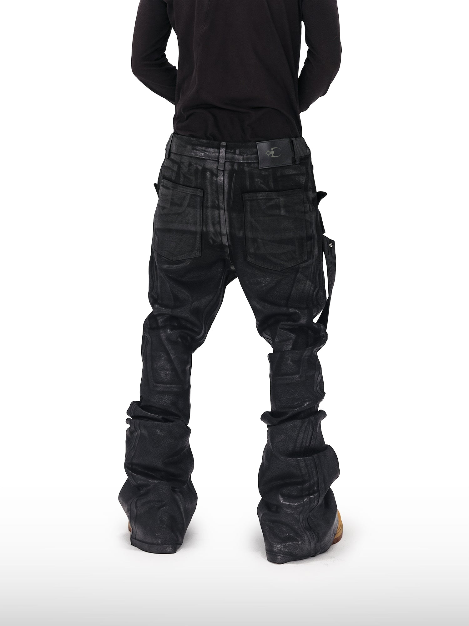 Gecoate jeans met bandjes en wijde pijpen