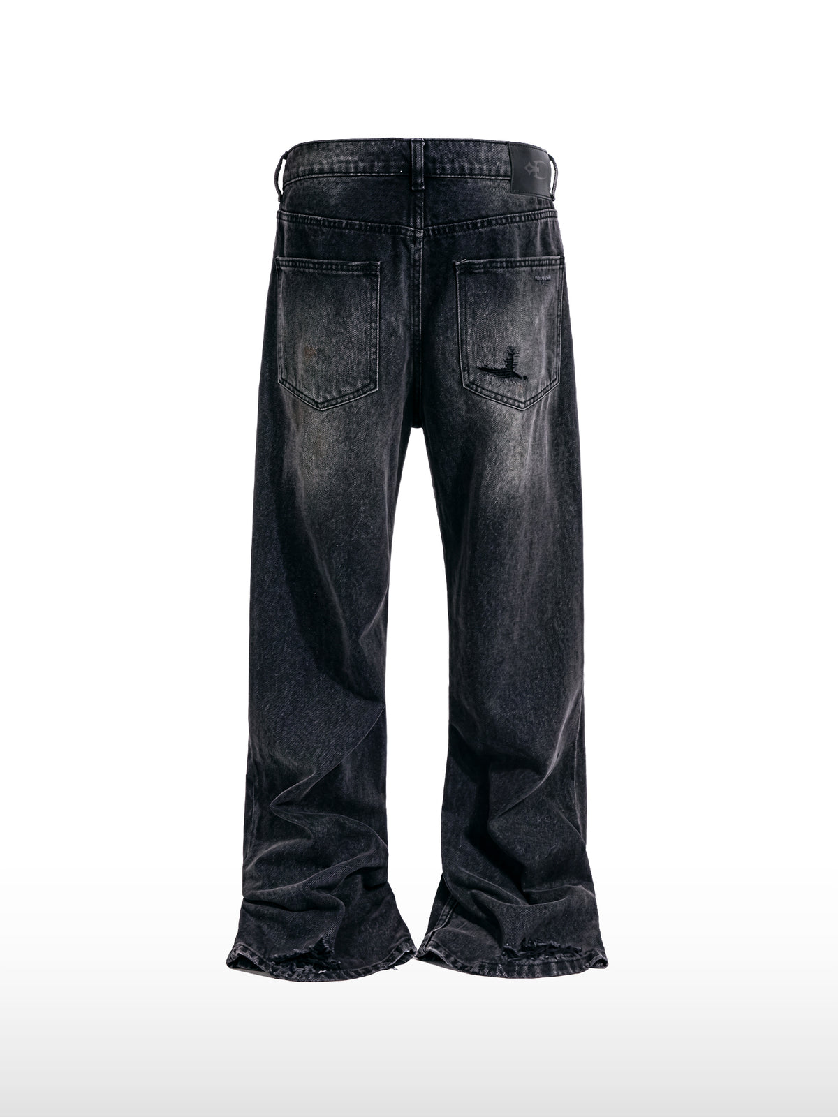 Zerrissene schwarze Schlagjeans